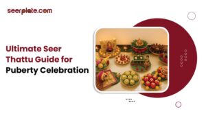Seer thattu arrangement with fruits, sweets, and decor items for South Indian puberty celebration traditions