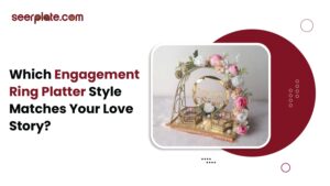 Elegant floral engagement ring platter with gold accents, twin ring boxes, and name frame, styled for modern couples by seerplate.com.